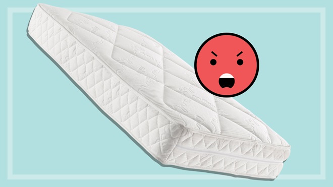 mattress with an angry emoji